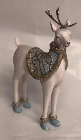 White and light blue deer figurine