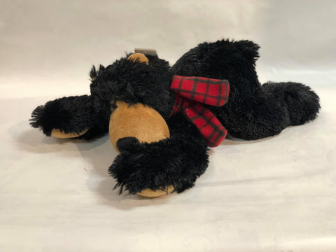 Plush black bear with scarf